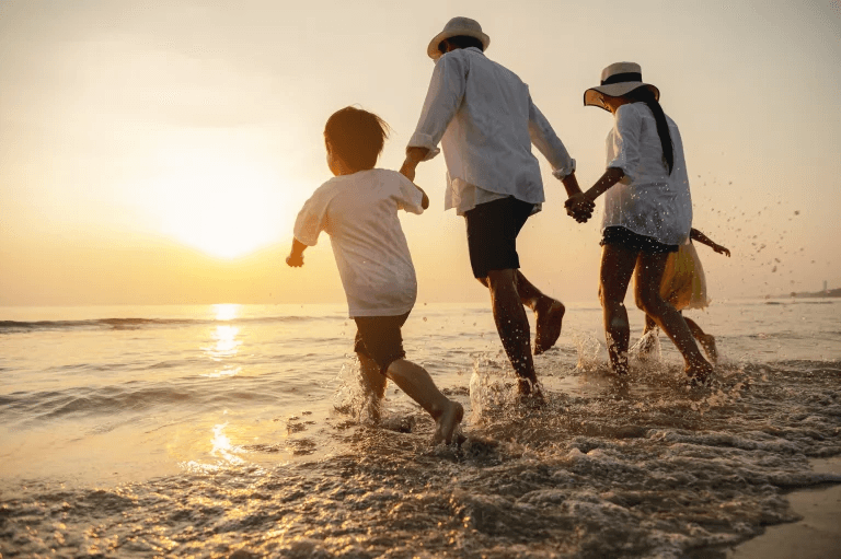 Family enjoying a luxury Mediterranean beach lifestyle in Costa Blanca North